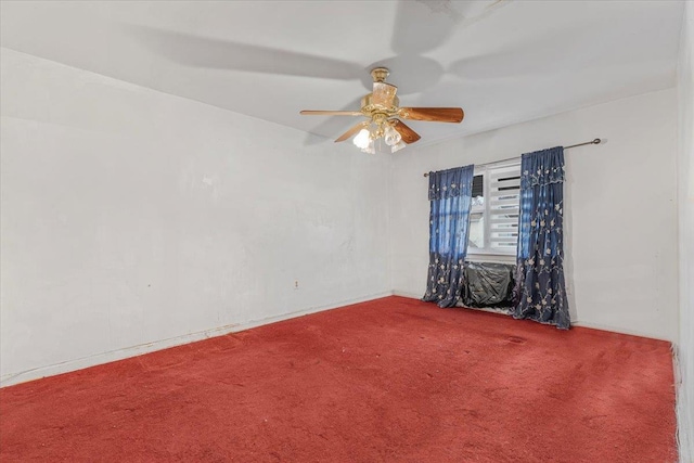 spare room featuring carpet flooring and ceiling fan