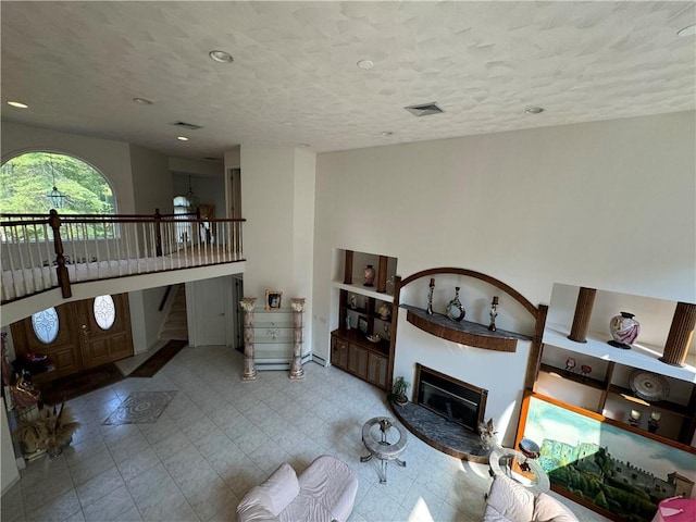 living room with a textured ceiling