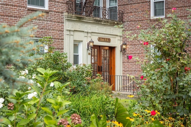 doorway to property with a balcony