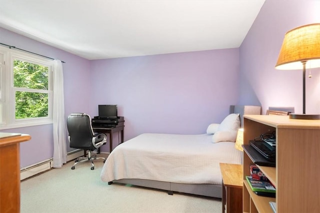 carpeted bedroom with baseboard heating