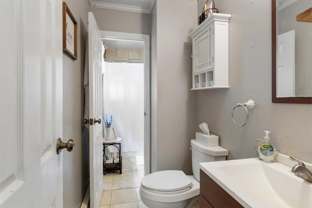 bathroom featuring vanity, tile patterned flooring, a shower with shower curtain, toilet, and ornamental molding