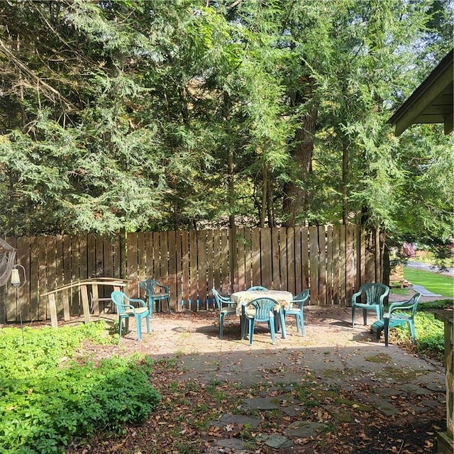 view of jungle gym featuring a patio