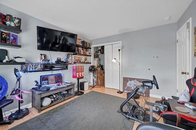 exercise area featuring hardwood / wood-style flooring