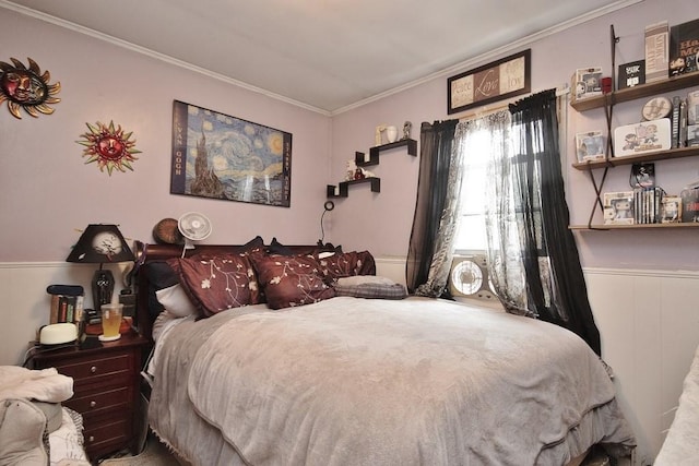 bedroom with crown molding