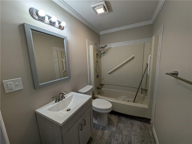 full bathroom featuring shower / bathing tub combination, wood-type flooring, toilet, vanity, and ornamental molding