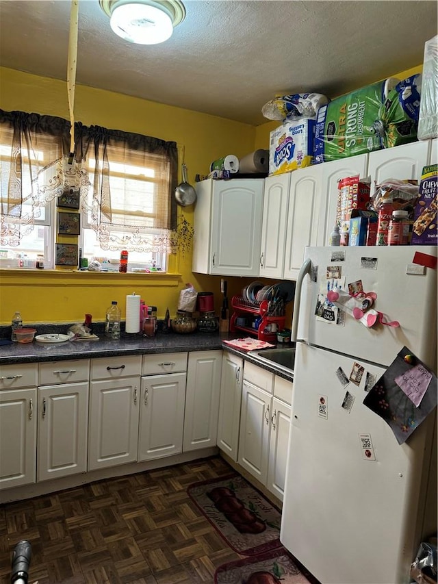 kitchen with white cabinetry