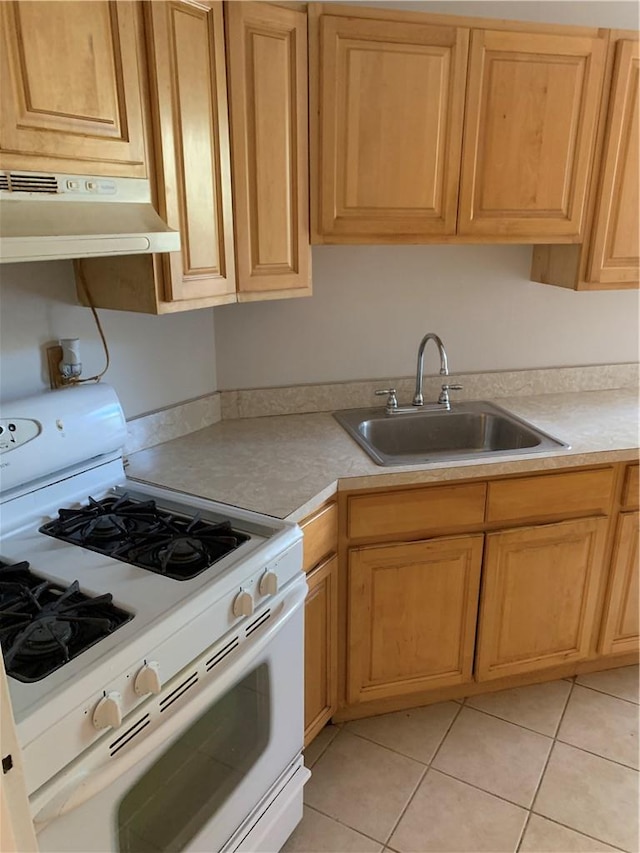 kitchen with tile walls and light brown cabinetry