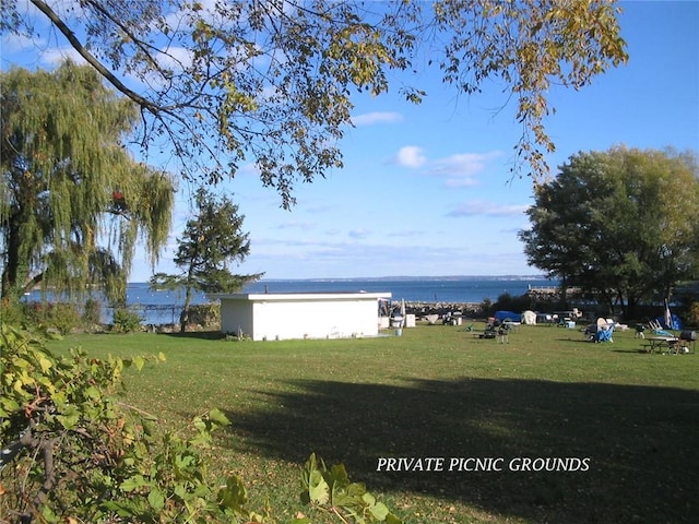 view of yard with a water view