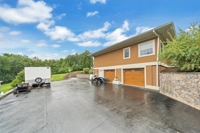 exterior space featuring a garage