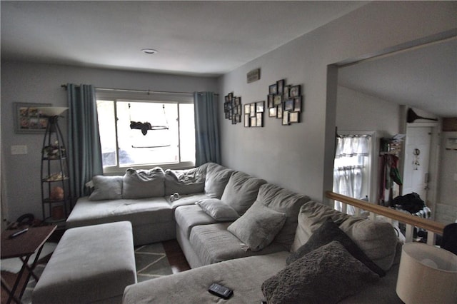 living room with lofted ceiling