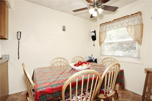 dining room with ceiling fan