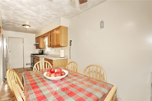 dining space with sink