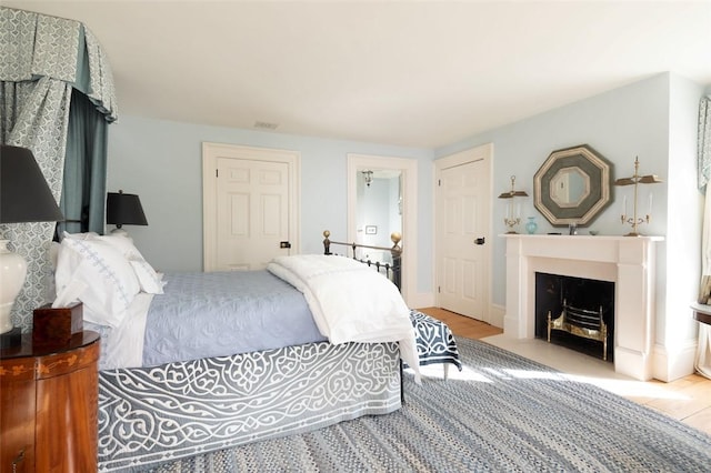 bedroom with light hardwood / wood-style floors