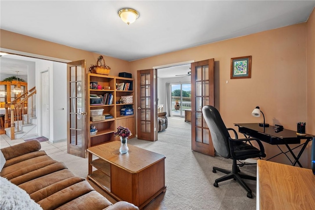 carpeted office featuring french doors