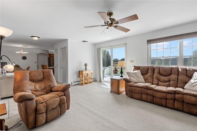 living room featuring ceiling fan and light colored carpet