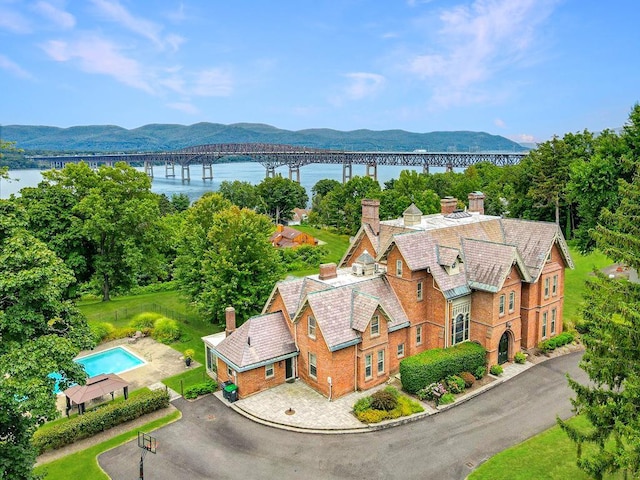 bird's eye view featuring a water and mountain view