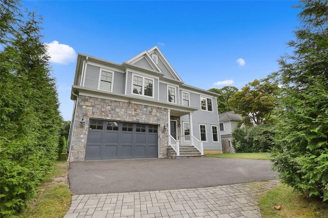 view of front of property featuring a garage