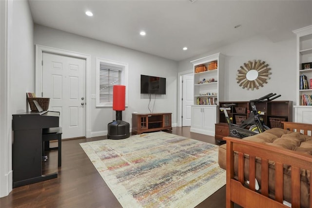 bedroom featuring dark hardwood / wood-style flooring