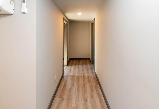 hallway featuring light wood-type flooring