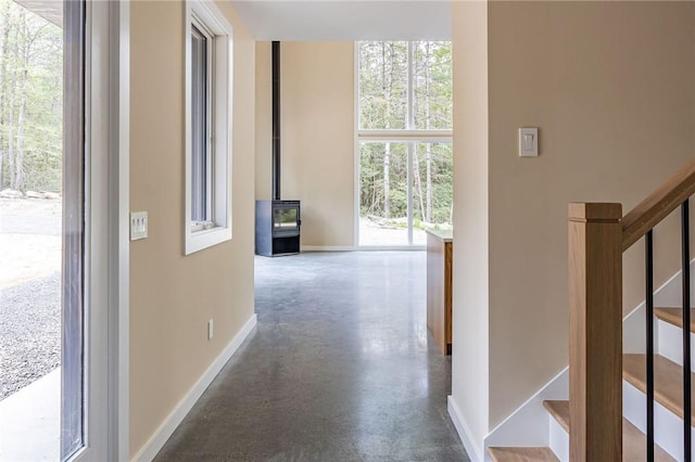 hallway with concrete floors