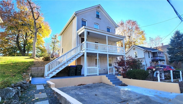 view of front property featuring covered porch