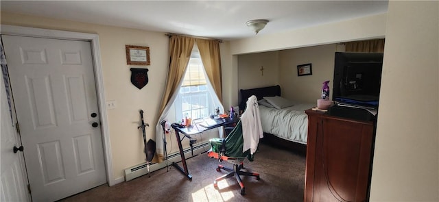 bedroom with carpet and baseboard heating