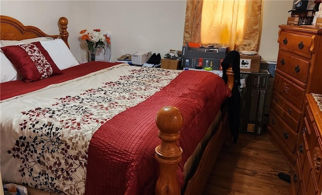 bedroom featuring wood-type flooring