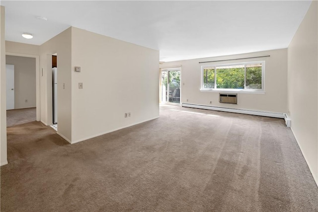 carpeted spare room with baseboard heating and a wall unit AC