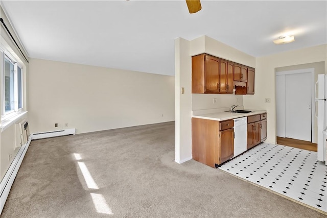 kitchen featuring white appliances, light colored carpet, and a baseboard heating unit