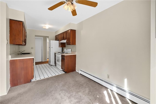 kitchen with ceiling fan, sink, a baseboard radiator, light colored carpet, and white appliances