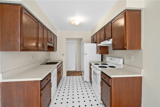 kitchen with white appliances and sink