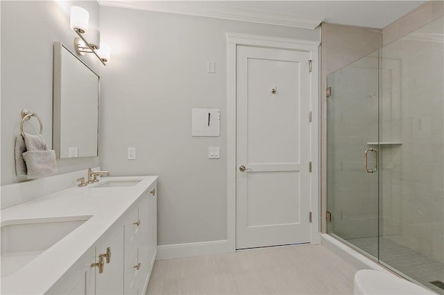 bathroom with tile patterned floors, vanity, and an enclosed shower