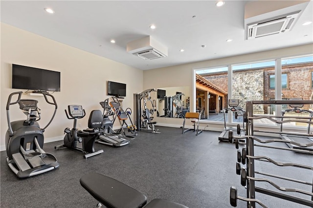 exercise room with a wall unit AC