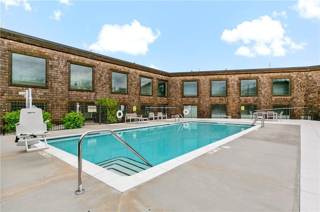 view of pool featuring a patio area