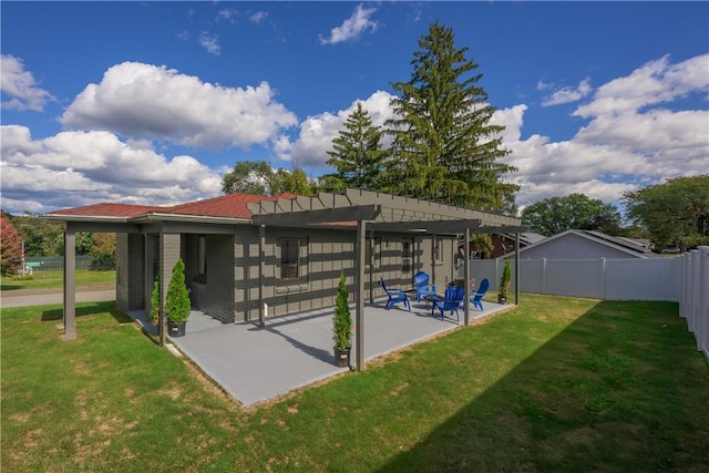 view of property's community with a yard, a pergola, and a patio area