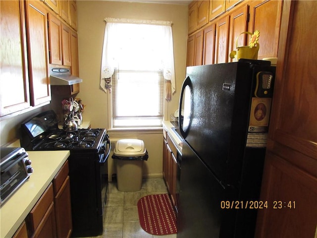 kitchen featuring black appliances