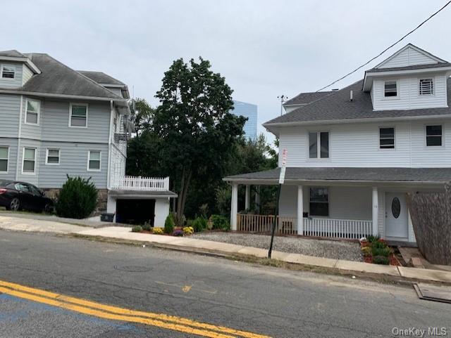 view of home's exterior featuring a porch