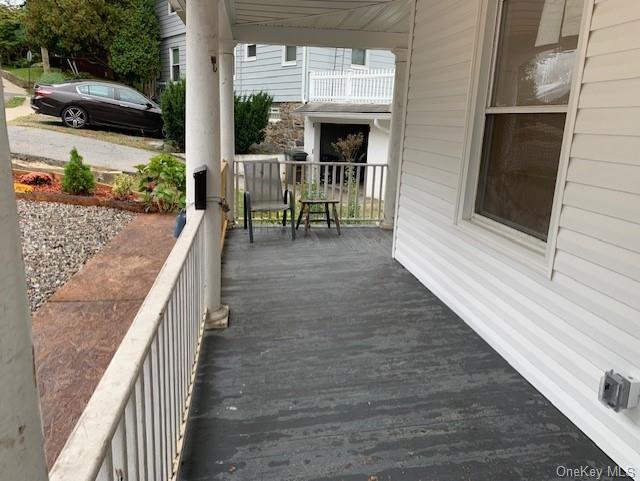 wooden deck with a porch