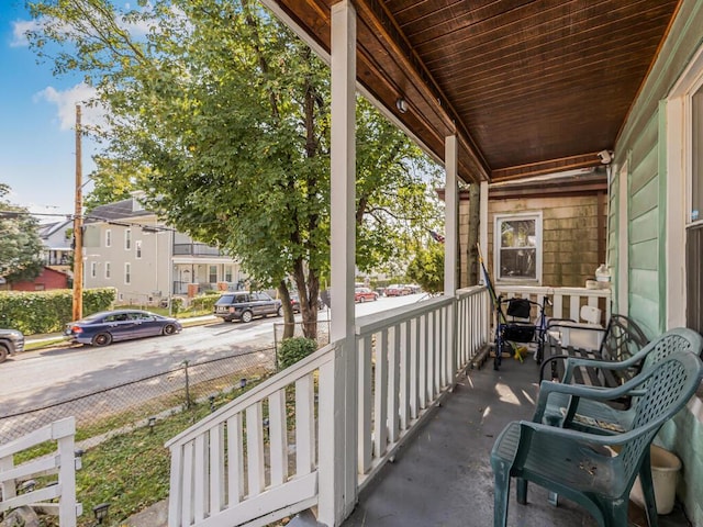 balcony featuring covered porch