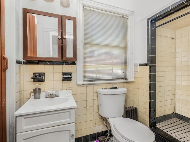 350 S 2nd Ave, Mount Vernon, NY 10550 - bathroom with a stall shower, toilet, vanity, and tile walls