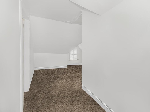 350 S 2nd Ave, Mount Vernon, NY 10550 - additional living space with carpet floors, vaulted ceiling, and baseboards
