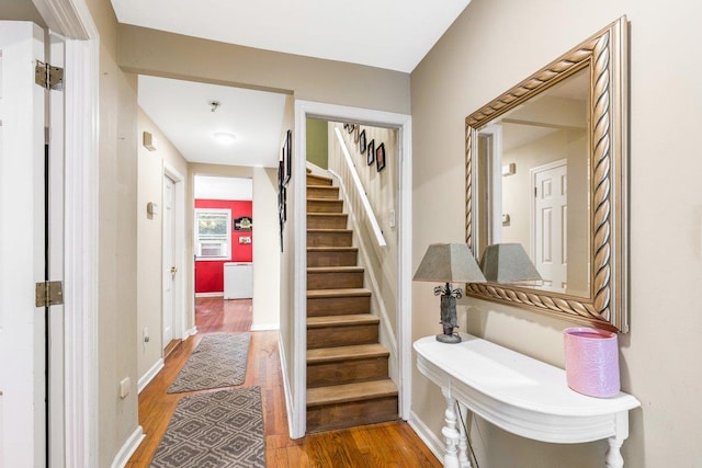 staircase featuring hardwood / wood-style floors