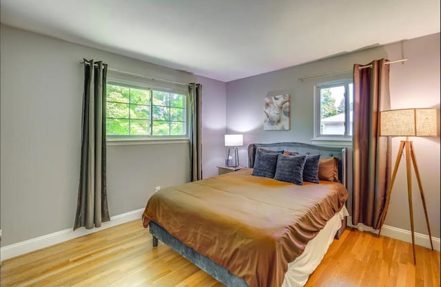 bedroom featuring light wood-type flooring