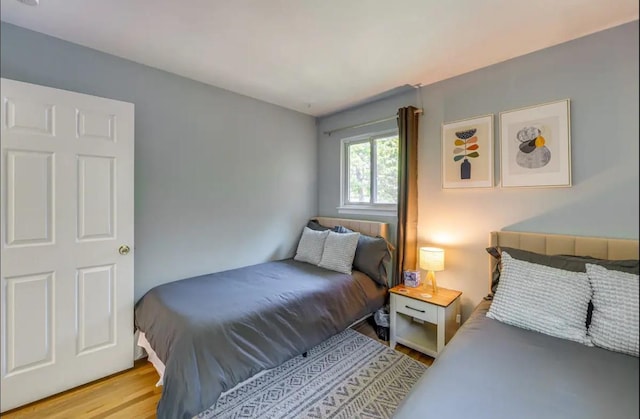 bedroom featuring light wood-type flooring