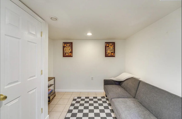 living area featuring light tile patterned flooring