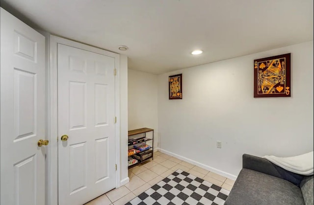 sitting room featuring light tile patterned floors