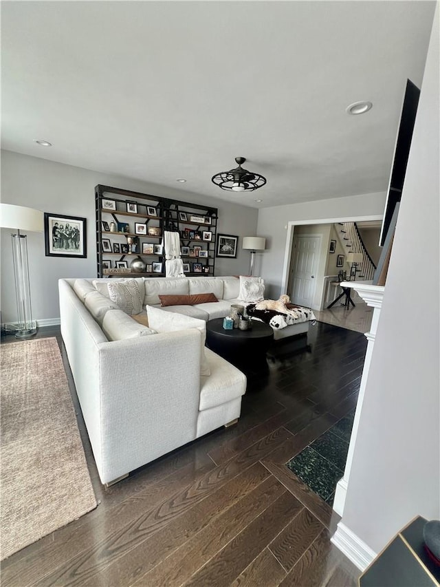 living room with dark wood-type flooring