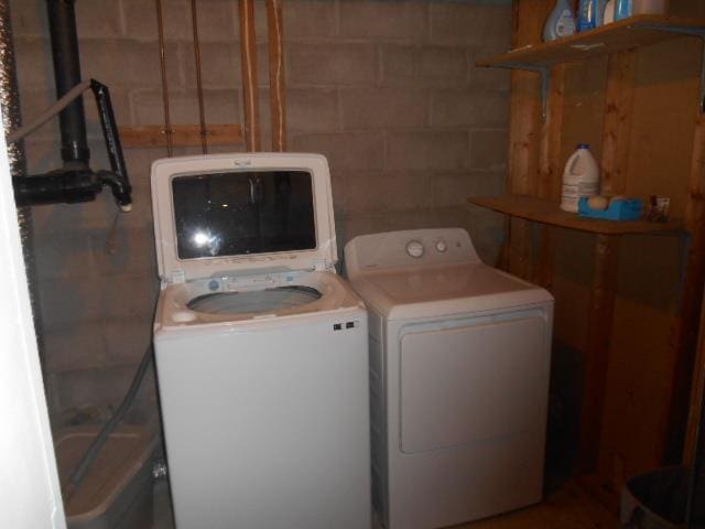 laundry room with separate washer and dryer