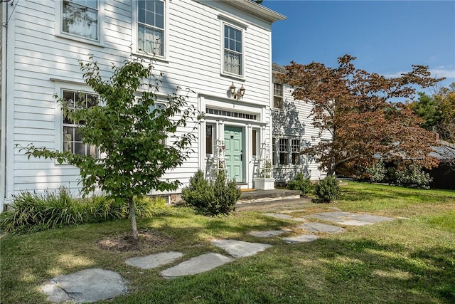 exterior space with a lawn