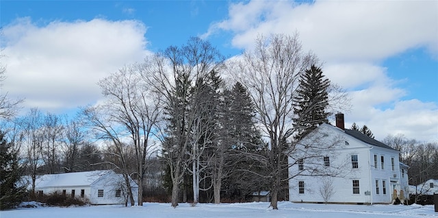 view of snow covered property